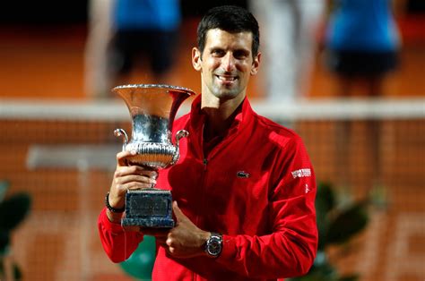 Novak djokovic celebrates after winning his sixth wimbledon title. Djokovic wins Italian Open for record 36th Masters title ...