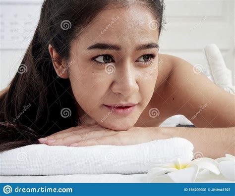 Young Woman And Spa Accessories On Massage Table Stock Image Image Of Cosmetic Person 164209331