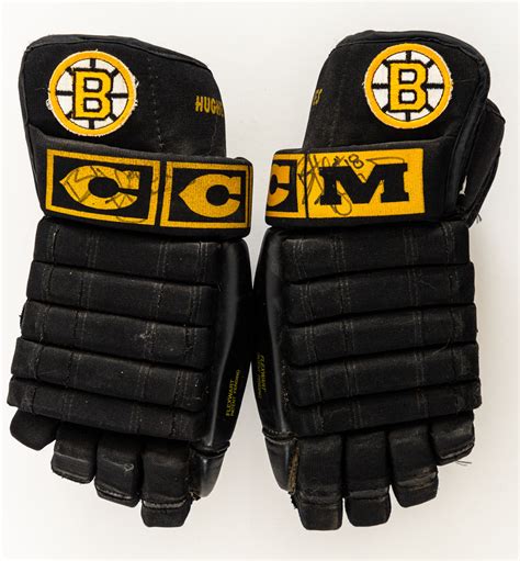 Lot Detail Boston Bruins Game Used Equipment Collection Of 4