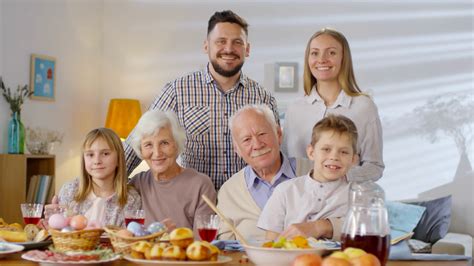 Portrait of happy family with children, parents and grandparents