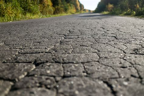 3 Signs Your Asphalt Needs Concrete Repairs Garrett Concrete