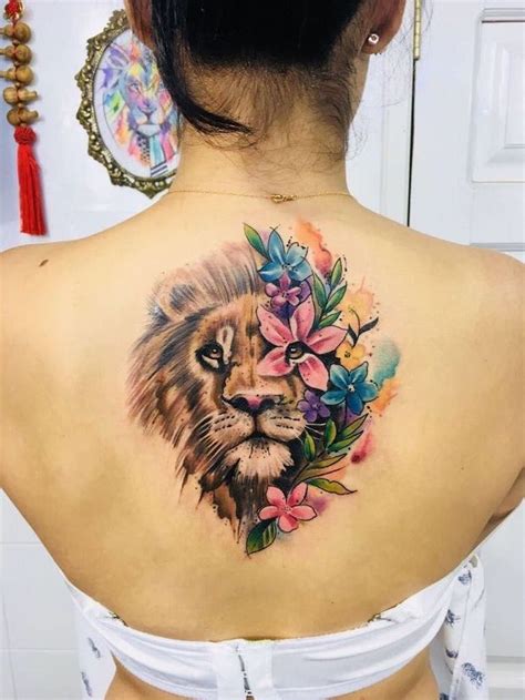 Back Tattoo On Woman With Black Hair Tribal Lion Tattoo Lion Head