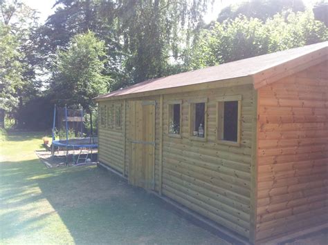 22x12 building 32mm tanalised log lap wall cladding