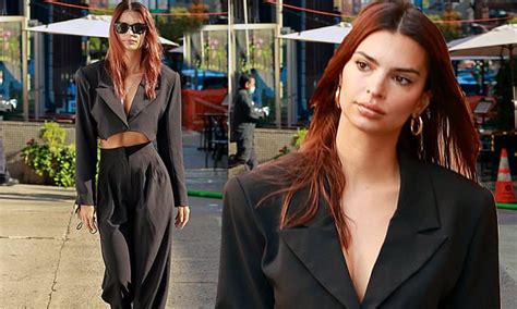 Emily Ratajkowski Flashes Her Cleavage And Supremely Toned Abs In A