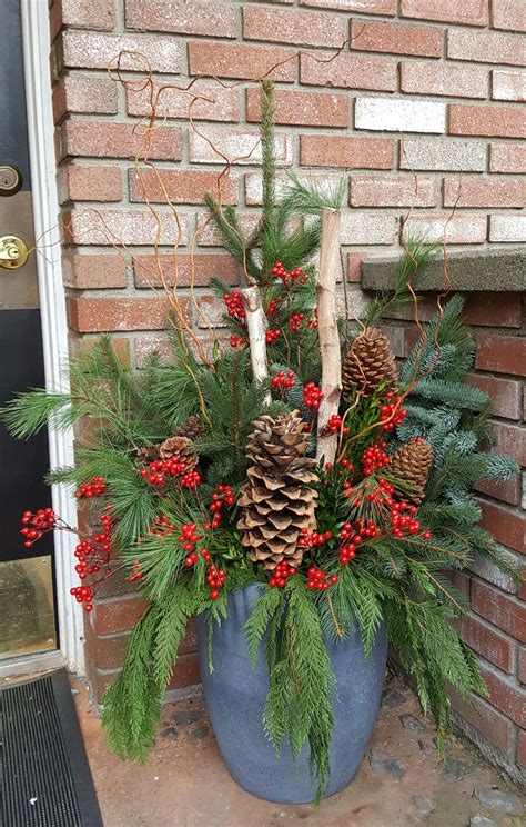 Looking outside at your barren or snowcovered garden in the dead of winter. Outdoor Winter Planter | Danielson Flowers