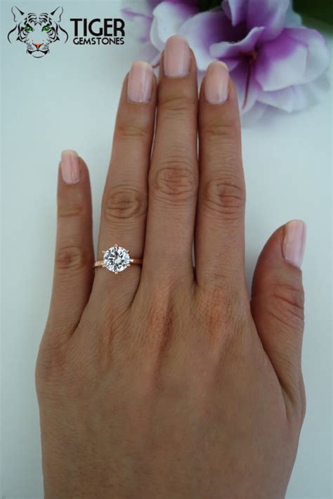Rose gold engagement rings are one of the hottest jewelry trends that offer a unique but timeless style. 2 Carat 6 Prong Solitaire Engagement Ring, Round Man Made ...