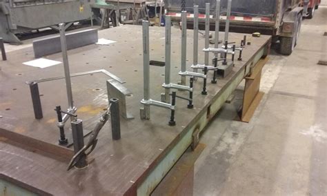 The included track was about an inch too long but the aluminum was easily cut. Here is my new 7'6 x 12' jig table.