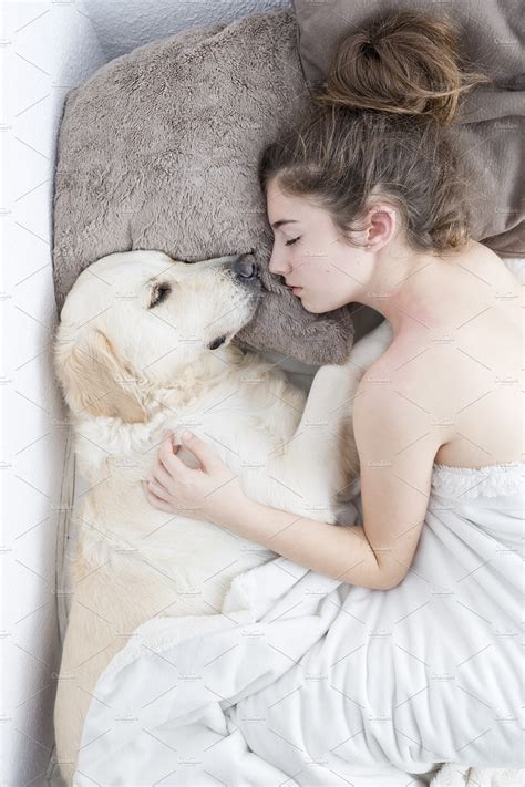 Teenage Girl Sleeping With Her Dog High Quality People Images
