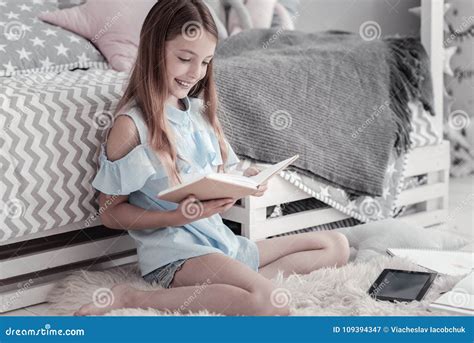 Happy Girl Reading A Book On The Floor Stock Image Image Of Home Adolescent 109394347