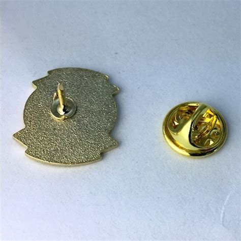 A boycott of the abc television network is encouraged because the executives at abc news are said to have told reporters they could not wear american flag lapel pins or any other patriotic insignia. 2B1 ASK1 Lapel Pin (Lime Green center)