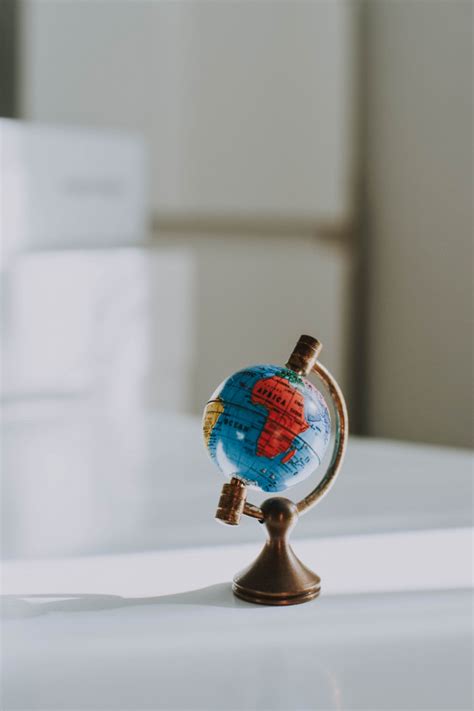 Free Photo Vertical Closeup Shot Of A Decorative Small Globe On A