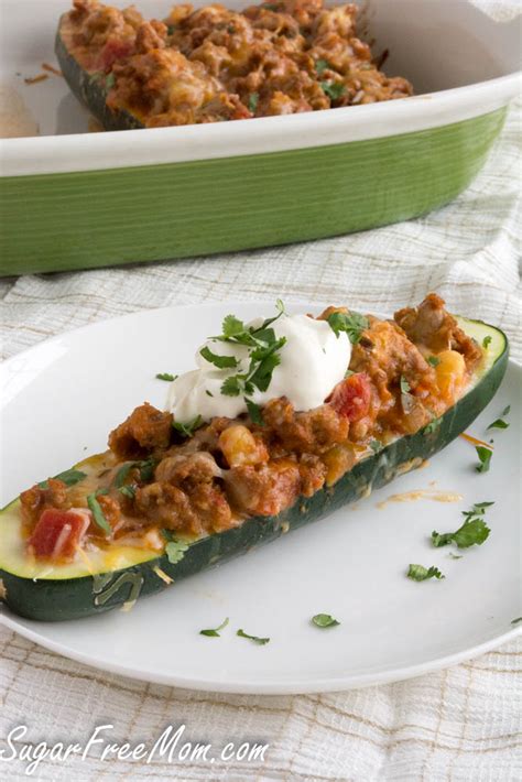 These taco stuffed zucchini boats are a tasty paleo, gluten free, easy dinner that is a great healthy meal prep dinner for beginners. Low Carb Taco Stuffed Zucchini Boats