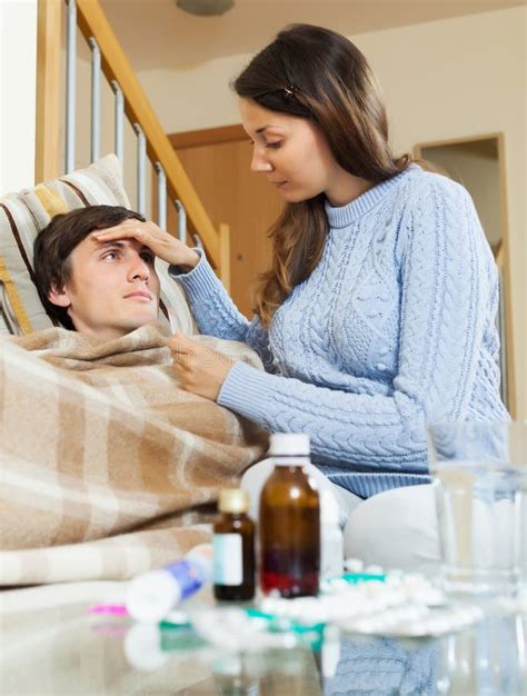 woman caring for sick guy who high temperature stock image image of husband illness 45674487