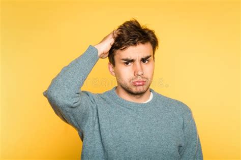 Perplexed Confused Thoughtful Man Holding Cheek Stock Photo Image Of