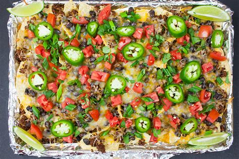 I make sheet pan nachos for dinner when i want something quick and easy. Sheet Pan Beef Nachos - Don't Sweat The Recipe