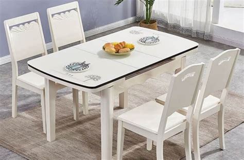 Rated 4.75 out of 5 stars. Retractable folding small apartment white solid wood dining table and chairs 008| Ola Zambia