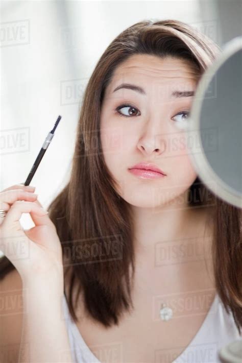 Girl Looking In Mirror Stock Photo Dissolve