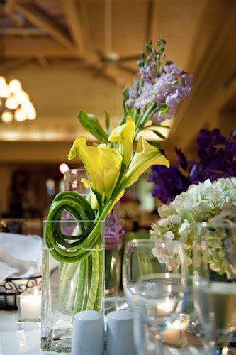 When it comes to choosing the right centerpieces for your wedding, table structures play an important role. exotic-yellow-and-green-centerpieces-wedding-ideas ...