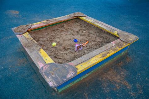 Sandbox With Toys On The Children`s Playground Copy Space Stock Photo