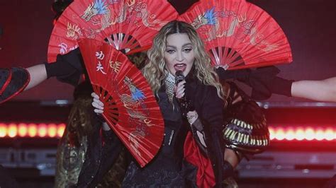madonna exposes 17 year old fan s breast during concert teen calls it the best moment of life