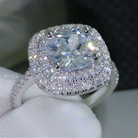 Classic and brilliant, this diamond ring features five beautifully matched cushion cut diamonds set in enduring platinum. 2016 fashion ring new style Cushion cut 4ct 5A Zircon ...