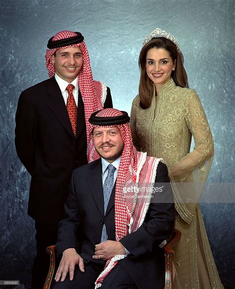 King Of Jordan Abdullah Ii Poses With His Wife Queen Rania And His Brother Crown Prince Hamzeh