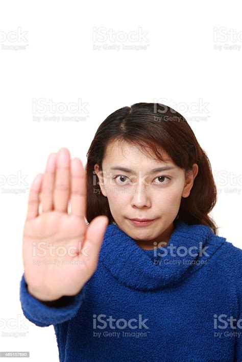 Japanese Woman Making Stop Gesture Stock Photo Download Image Now