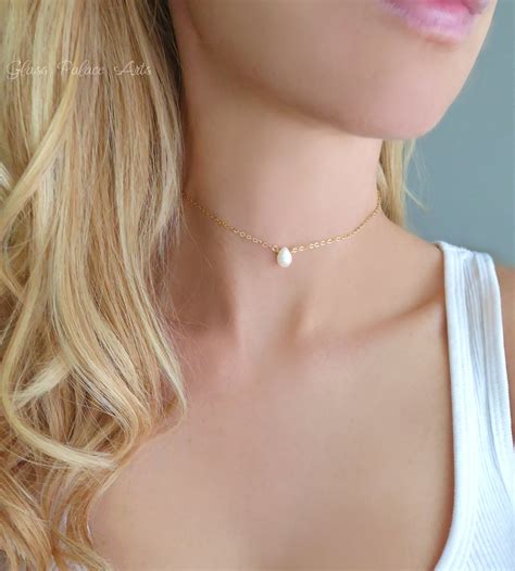 A Glossy And Nearly Flawless Genuine Freshwater Pearl Makes Up This