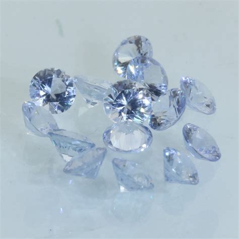 One Light Blue Sapphire Diamond Cut Round Ceylon Average 18 Carat