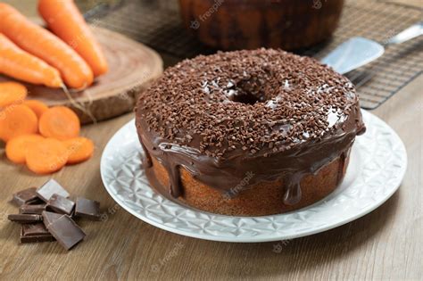 Premium Photo Brazilian Carrot Cake With Chocolate Frosting On Wooden