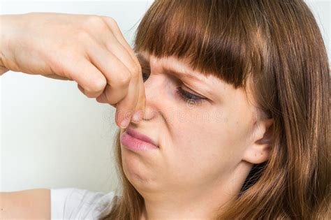 Woman Holding Her Nose Bad Smell Concept Stock Photo Image Of Close