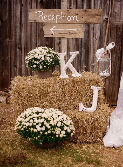 Hay Bales And Flowers For A Rustic Wedding Theme Wedding Backyard