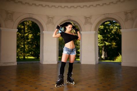Beautiful Girl In Cut Offs And On Roller Skates In City Park Stock Image Image Of Roller