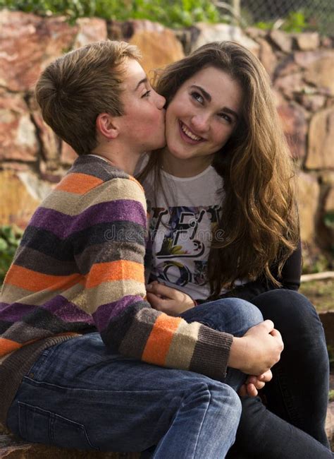 Brother Kissing His Sister On Her Cheek Stock Image Image Of Sitting Siblings 32101705