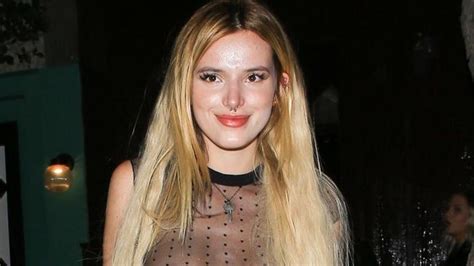 Bella Thorne Shows Off Her Nipple Piercing In A Sheer Top Photos