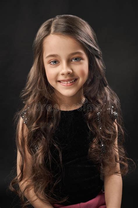 Portrait Of Pretty Little Girl In Black Velvet Dress Stock Image