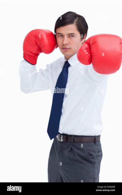 Attacking Fist Of Tradesman In Boxing Glove Stock Photo Alamy