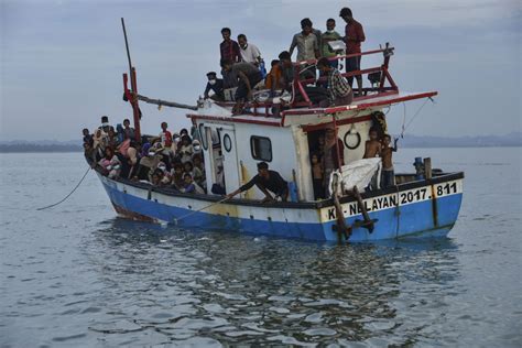 indonesia rejects rohingya refugees sends stricken boat to malaysia catholic news philippines