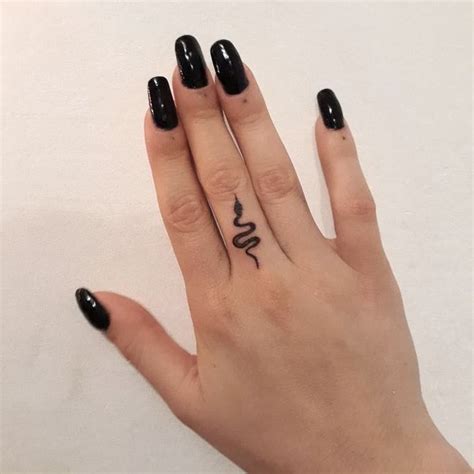 Snake Small Hand Tattoo This Small Snake Tattoo Is Edgy And Cool And