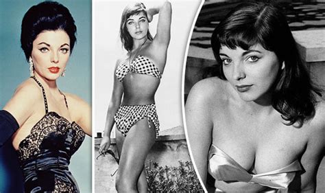 Joan Collins Flaunts Ample Assets As She Strips Off In Smouldering Boob Baring Throwbacks