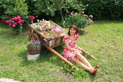 Young Woman Sitting In The Garden Stock Image Image Of Hair Human