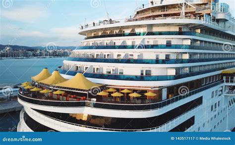 Large Cruise Ship Sailing Across Sea Near The Harbor Stock Top View