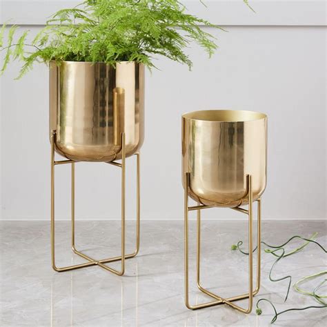 Give everyone green envy with modern planters and garden pots. Spun Metal Standing Planter | west elm UK
