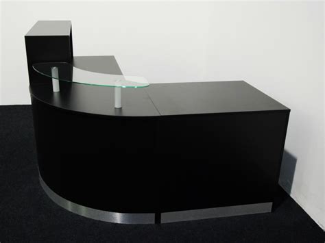The front in fact, you can choose any color you want for your reception. Black Reception Desk