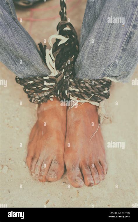 Hopeless Man Feet Tied Together With Rope Stock Photo Alamy