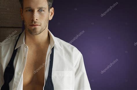 Man Wearing Unbuttoned Shirt Stock Photo By Londondeposit 21788025