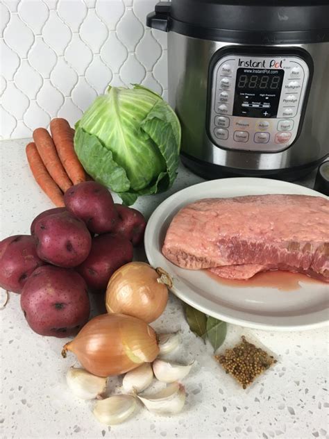 Return the trivet to the instant pot® and add the carrots, potatoes, and cabbage on top. Instant Pot Corned Beef and Cabbage Without Beer - Hello Nature