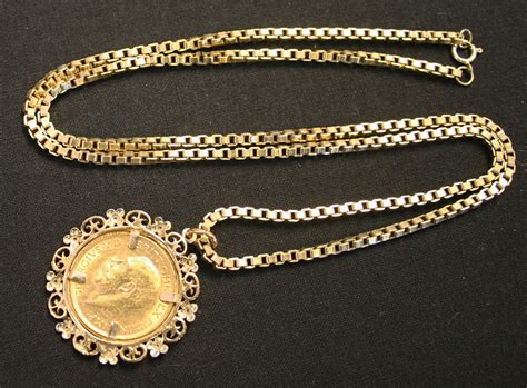 A George V Sovereign In A Ct Gold And Diamond Set Pendant Mount