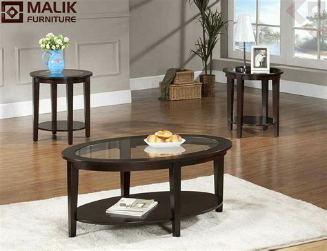 Many models are closer to works of art than the usual ideal of a dining table. Malik Furniture | Wooden Centre Table With Glass Top ...
