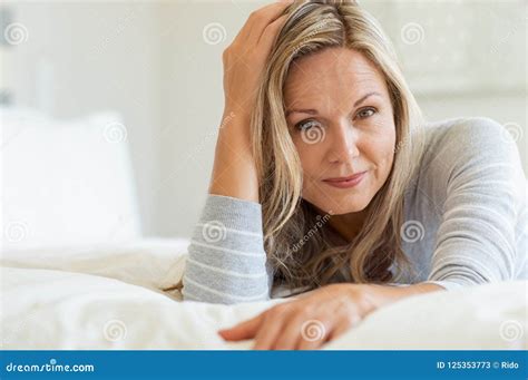 Mature Woman Relaxing On Bed Stock Image Image Of Looking Relaxing